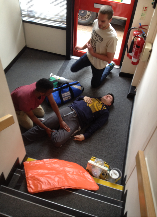 Medics giving first aid